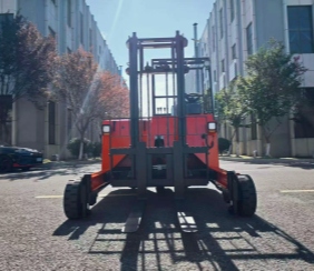 forklift mounted on back of truck